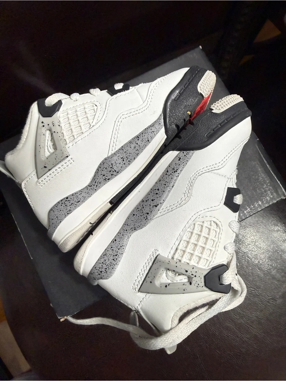 Nike Kids White Sneakers with Black Soles and Red Jumpman